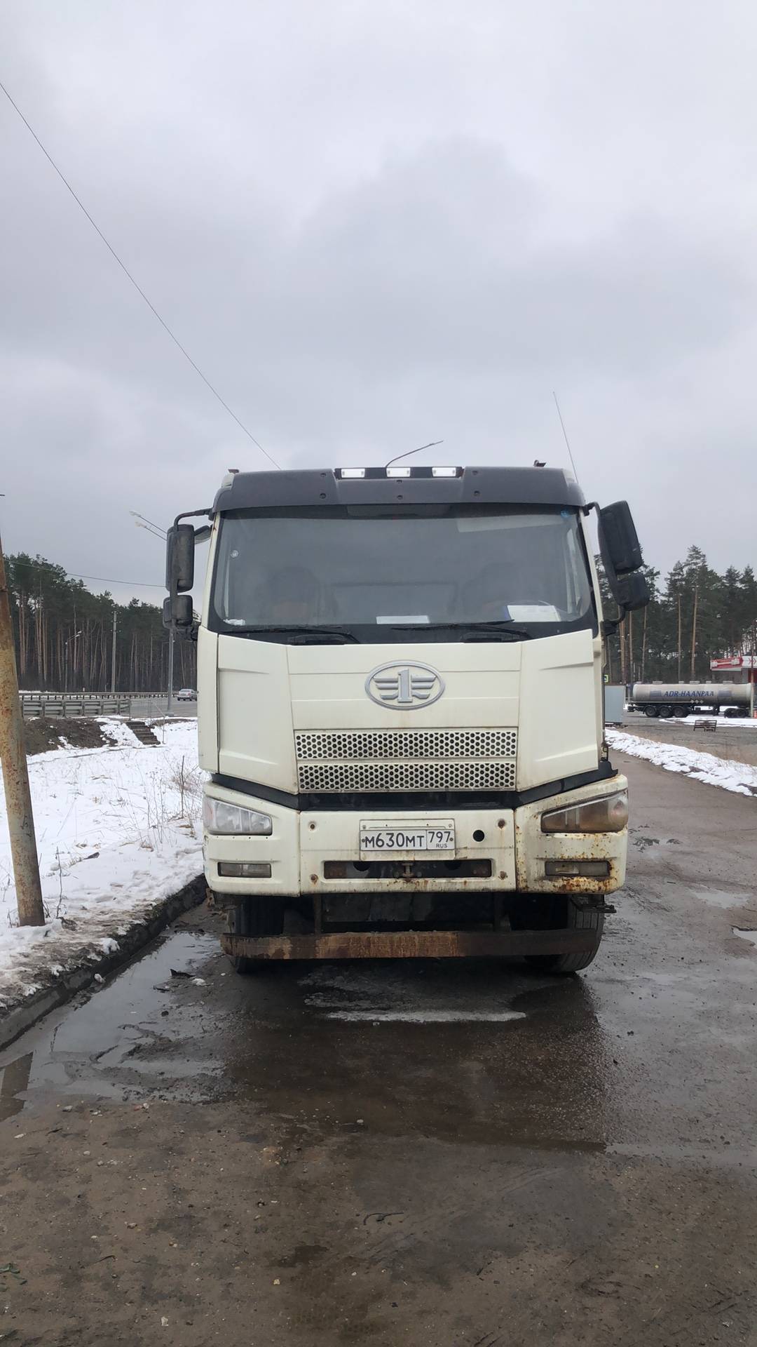 FAW CA3310P66K24T4E5 8х4 специализированный для работы c acфaльтoуклaдчиком Лот 000009007