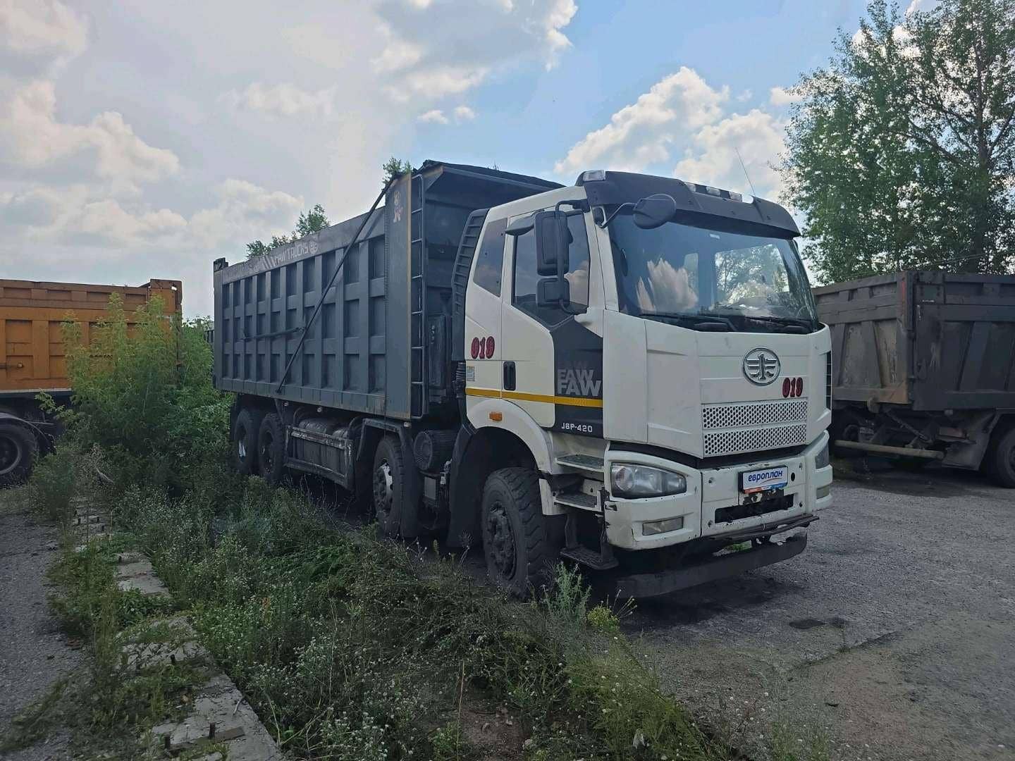 FAW CA3311P66K24T4E5 8х4,  396 760 км, 2022 года в лизинг