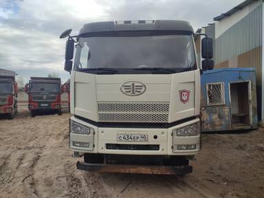 FAW CA3310P66K24T4E5 8х4 специализированный для работы c acфaльтoуклaдчиком