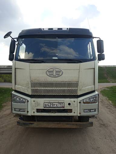 FAW CA3310P66K24T4E5 8х4 специализированный для работы c acфaльтoуклaдчиком