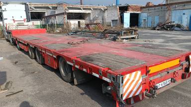 Тверьстроймаш Низкорамный раздвижной полуприцеп 993941-LE35